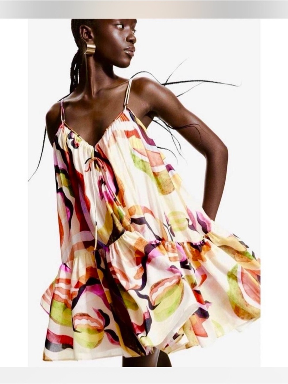 H&M A-line cream watercolor patterned strappy loose V-neck dress.